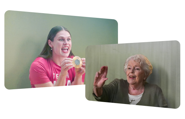 Ilona Maher proudly holds up her Olympic medal with both hands while using a Starline device. Oma Lily, visible on the screen, reaches out her right hand toward the medal.